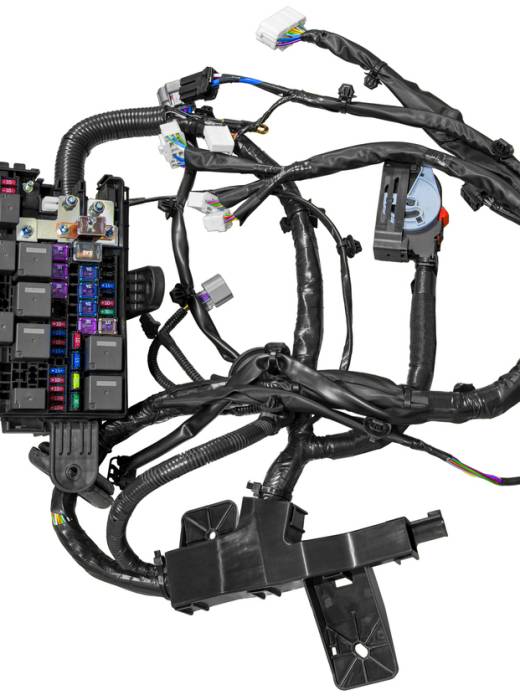 new car fuse box with wiring on white background